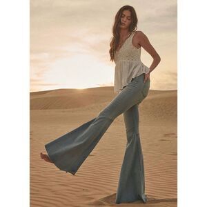 Revolve Pistola Women’s Ultra flare Leg  Distressed Pants- Fray /RawHem, Size 28